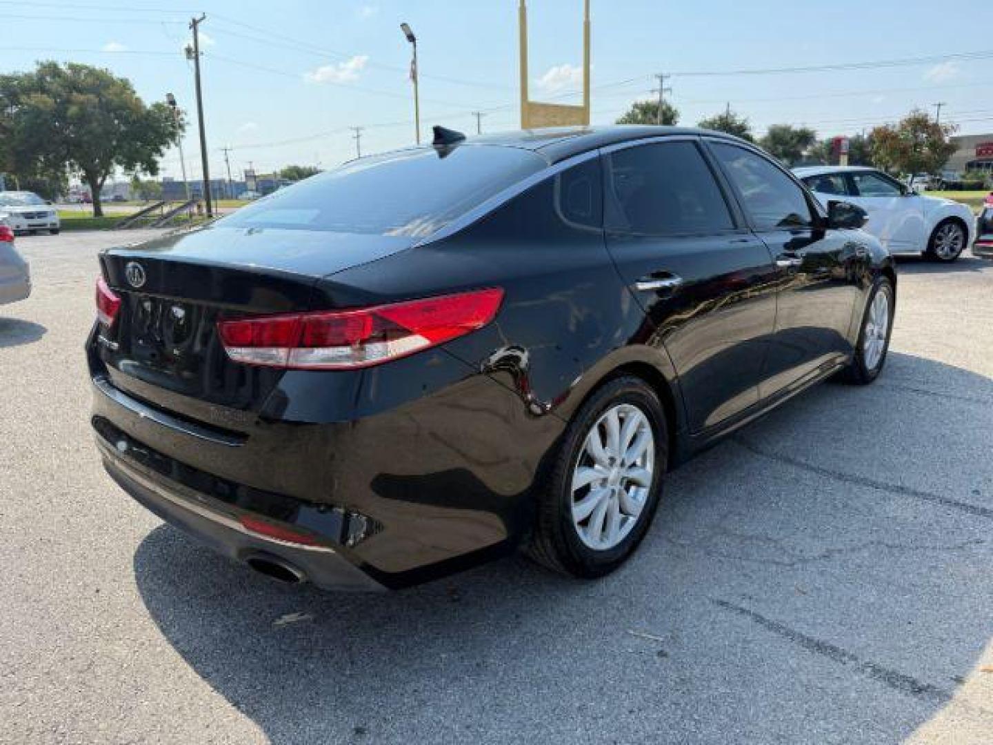 2016 BLACK Kia Optima LX (5XXGT4L35GG) with an Theta II 2.4L I-4 ga engine, located at 2715 W Pioneer Pkwy, Arlington, TX, 76013, (817) 265-9009, 32.710262, -97.153236 - Photo#6