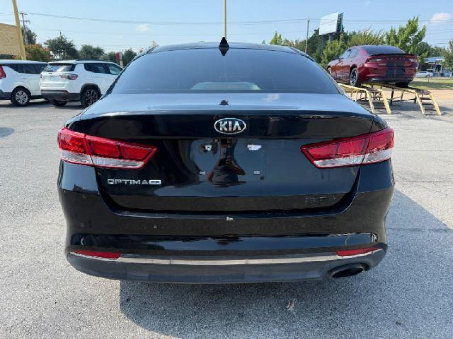 2016 BLACK Kia Optima LX (5XXGT4L35GG) with an Theta II 2.4L I-4 ga engine, located at 2715 W Pioneer Pkwy, Arlington, TX, 76013, (817) 265-9009, 32.710262, -97.153236 - Photo#7