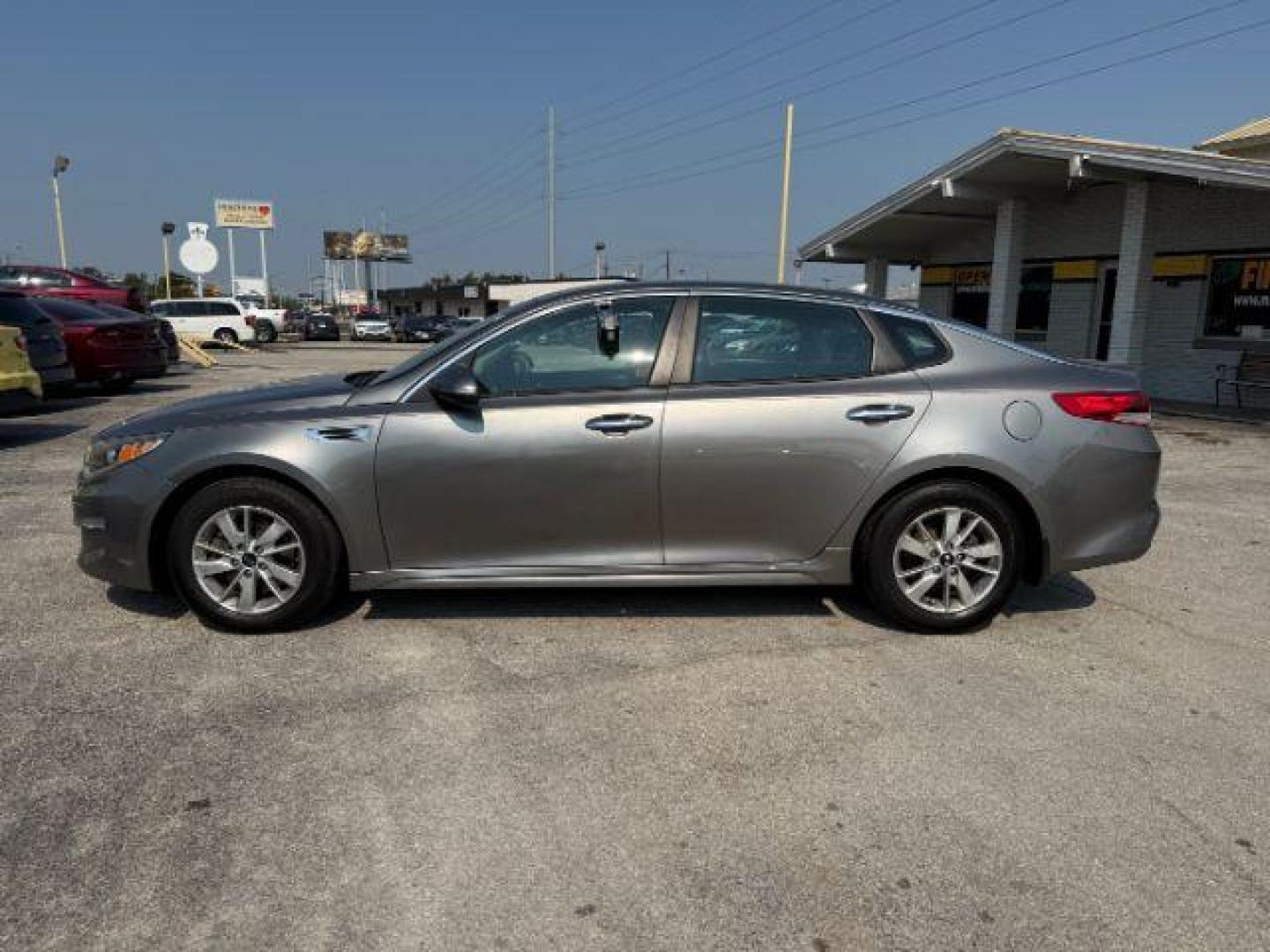 2016 GRAY Kia Optima LX (5XXGT4L31GG) with an Theta II 2.4L I-4 gasoline direct injection engine, located at 2715 W Pioneer Pkwy, Arlington, TX, 76013, (817) 265-9009, 32.710262, -97.153236 - Photo#2