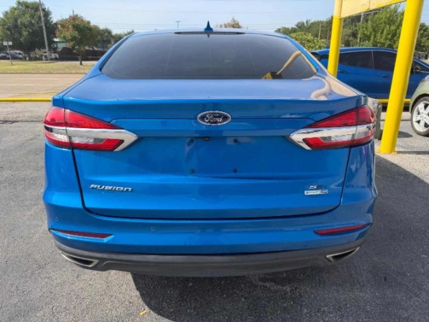 2019 BLUE Ford Fusion SE (3FA6P0T95KR) with an EcoBoost 2L I-4 gaso engine, located at 2715 W Pioneer Pkwy, Arlington, TX, 76013, (817) 265-9009, 32.710262, -97.153236- Photo#7