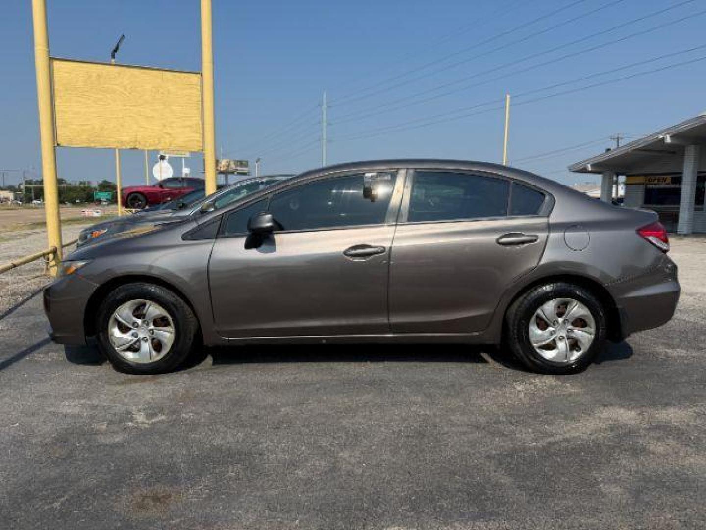 2013 BROWN Honda Civic LX (2HGFB2F55DH) with an 1.8L I-4 i-VTEC variable valve control engine, located at 2715 W Pioneer Pkwy, Arlington, TX, 76013, (817) 265-9009, 32.710262, -97.153236 - Photo#1