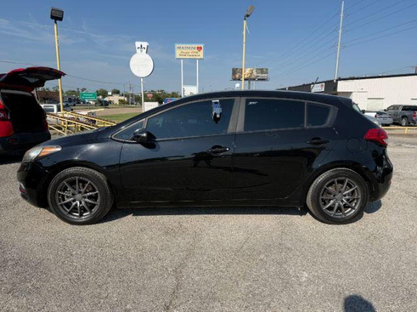 2016 BLACK Kia Forte LX (KNAFK5A89G5) with an 2L I-4 gasoline direct injection engine, located at 2715 W Pioneer Pkwy, Arlington, TX, 76013, (817) 265-9009, 32.710262, -97.153236 - Photo#2