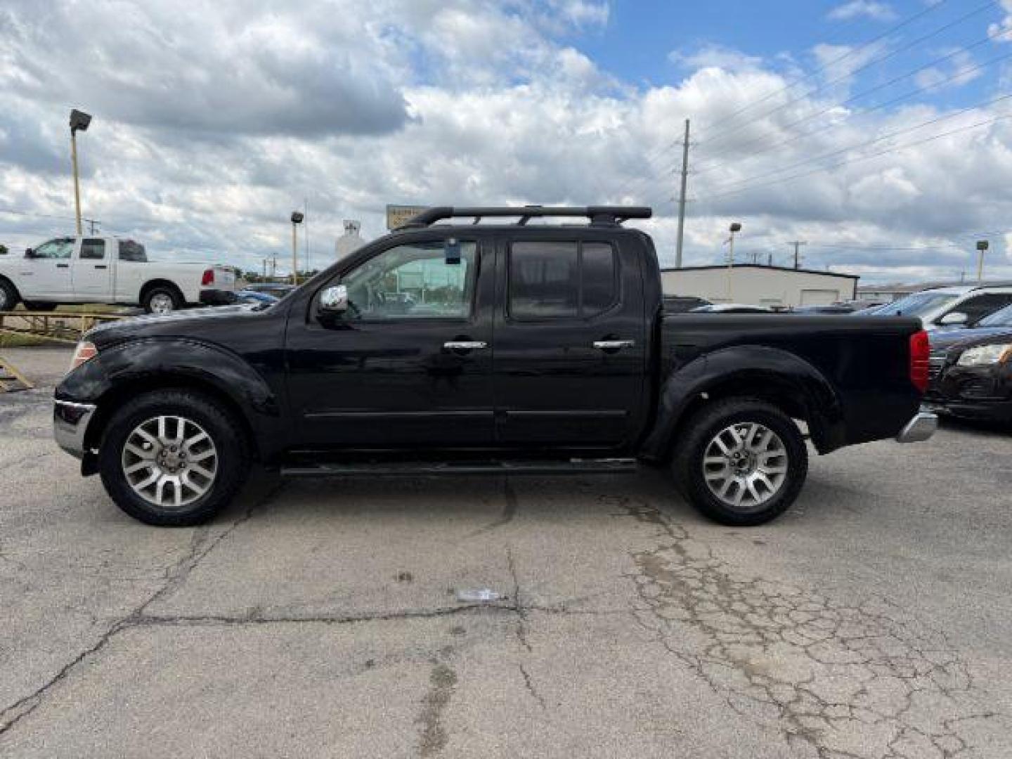 2012 GRAY Nissan Frontier SL (1N6AD0ER1CC) with an VQ 4L V-6 DOHC engine, located at 2715 W Pioneer Pkwy, Arlington, TX, 76013, (817) 265-9009, 32.710262, -97.153236 - Photo#2