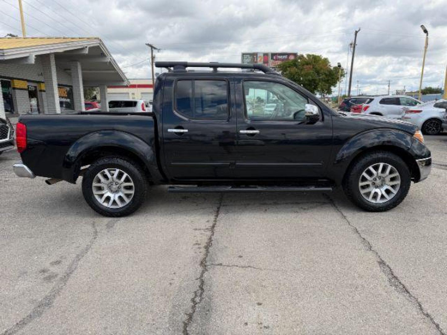 2012 GRAY Nissan Frontier SL (1N6AD0ER1CC) with an VQ 4L V-6 DOHC engine, located at 2715 W Pioneer Pkwy, Arlington, TX, 76013, (817) 265-9009, 32.710262, -97.153236 - Photo#6