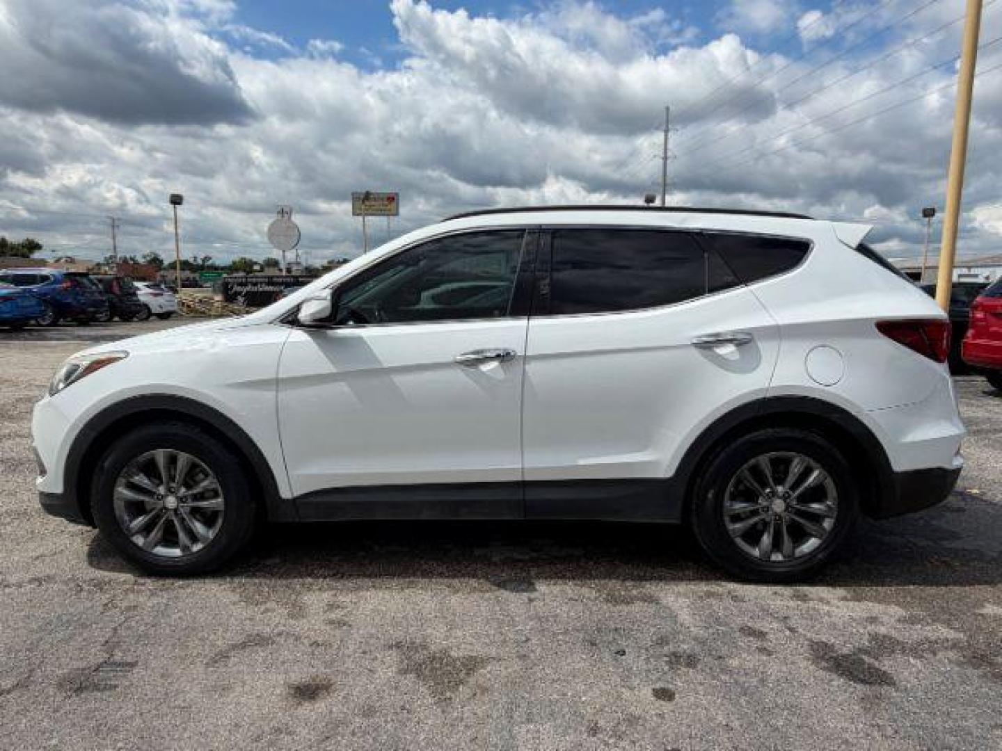 2017 Hyundai Santa Fe Sport 2.0T (5NMZU4LA8HH) with an Theta II 2L I-4 gasoline direct injection engine, located at 2715 W Pioneer Pkwy, Arlington, TX, 76013, (817) 265-9009, 32.710262, -97.153236 - Photo#1