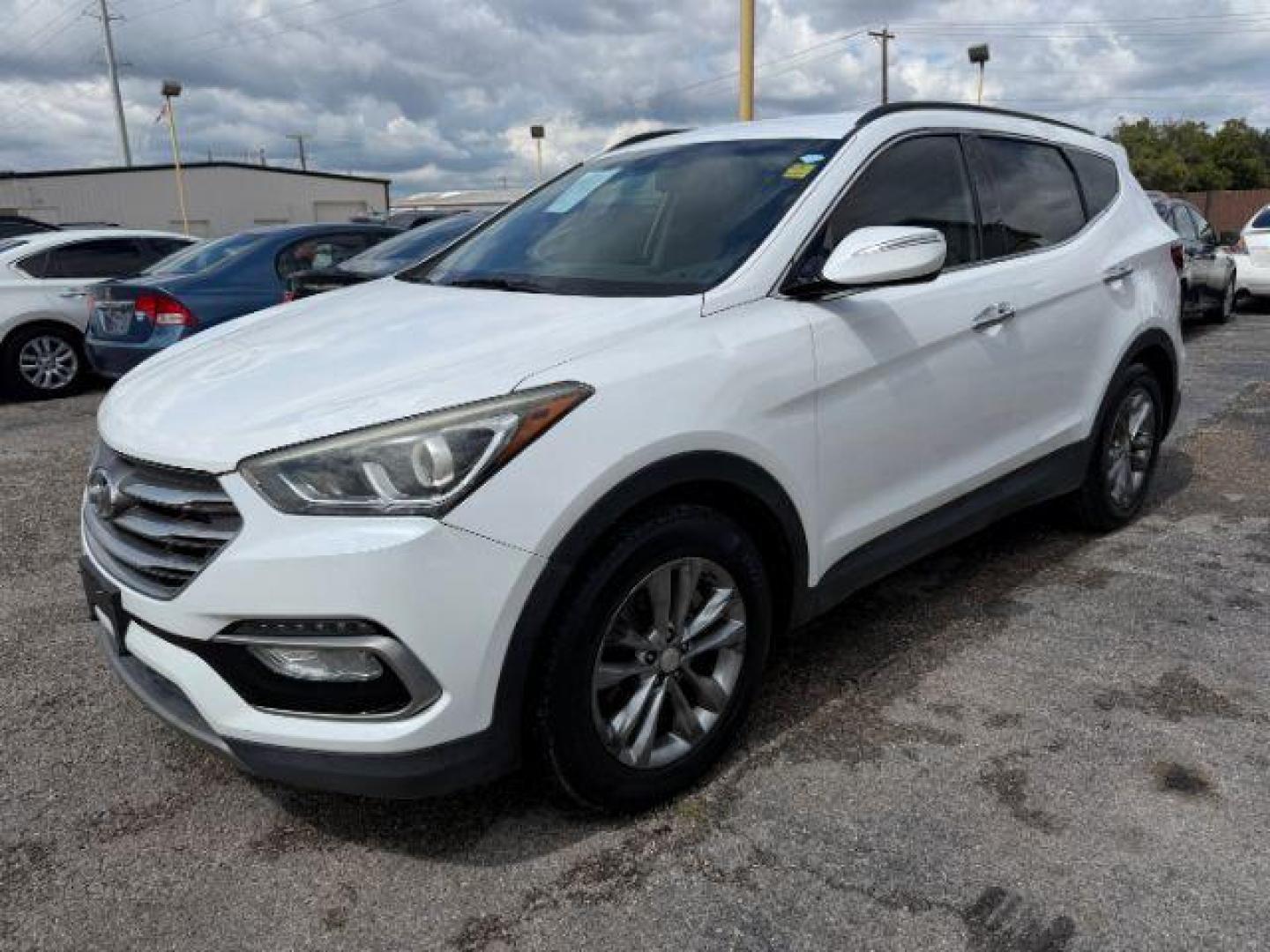 2017 Hyundai Santa Fe Sport 2.0T (5NMZU4LA8HH) with an Theta II 2L I-4 gasoline direct injection engine, located at 2715 W Pioneer Pkwy, Arlington, TX, 76013, (817) 265-9009, 32.710262, -97.153236 - Photo#2