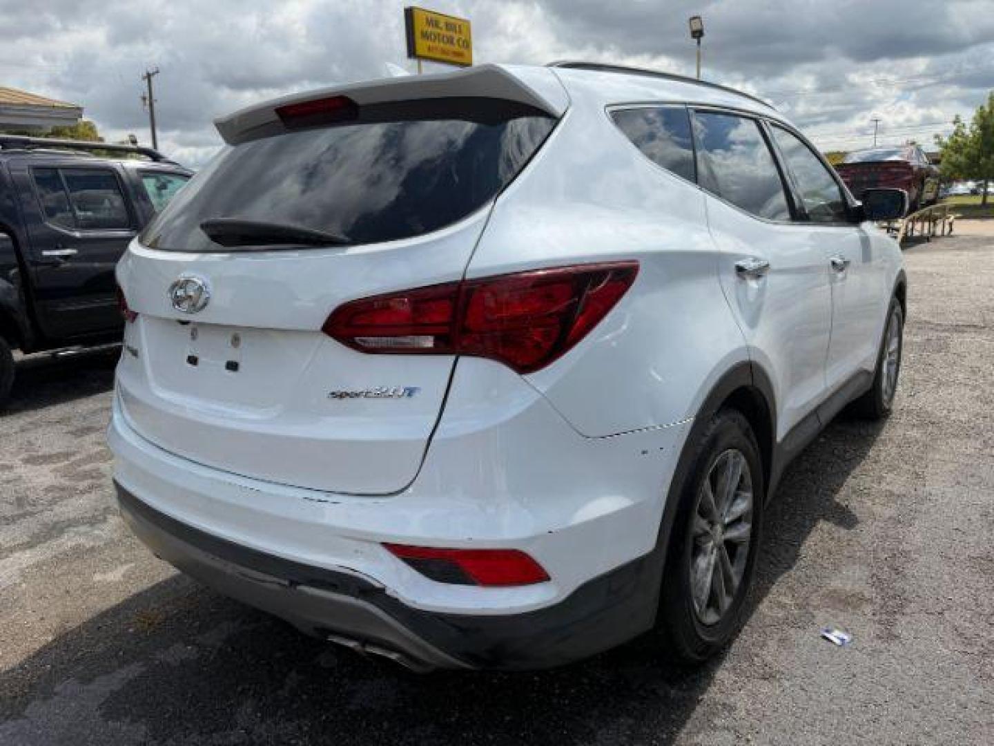 2017 Hyundai Santa Fe Sport 2.0T (5NMZU4LA8HH) with an Theta II 2L I-4 gasoline direct injection engine, located at 2715 W Pioneer Pkwy, Arlington, TX, 76013, (817) 265-9009, 32.710262, -97.153236 - Photo#5