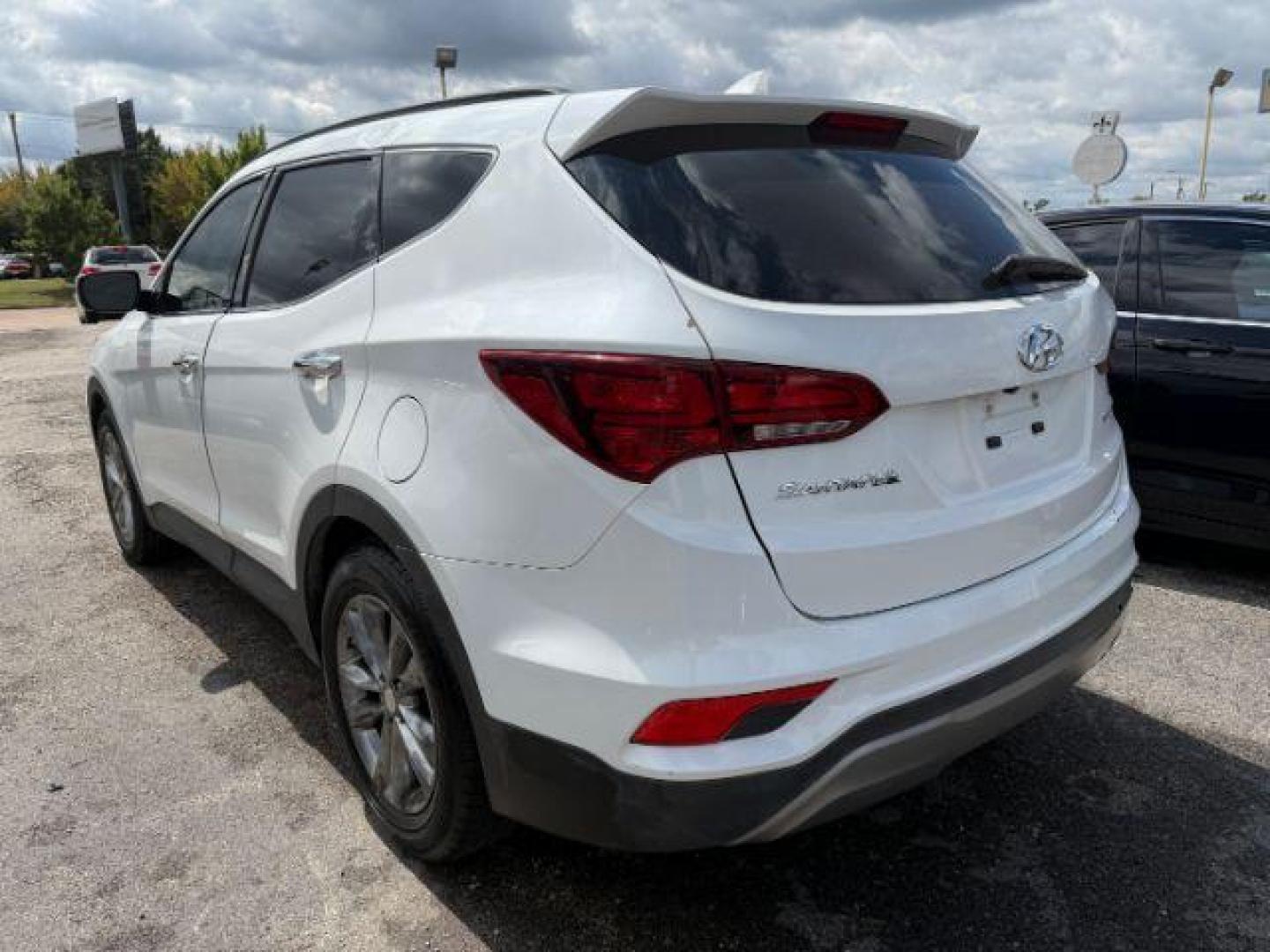 2017 Hyundai Santa Fe Sport 2.0T (5NMZU4LA8HH) with an Theta II 2L I-4 gasoline direct injection engine, located at 2715 W Pioneer Pkwy, Arlington, TX, 76013, (817) 265-9009, 32.710262, -97.153236 - Photo#7