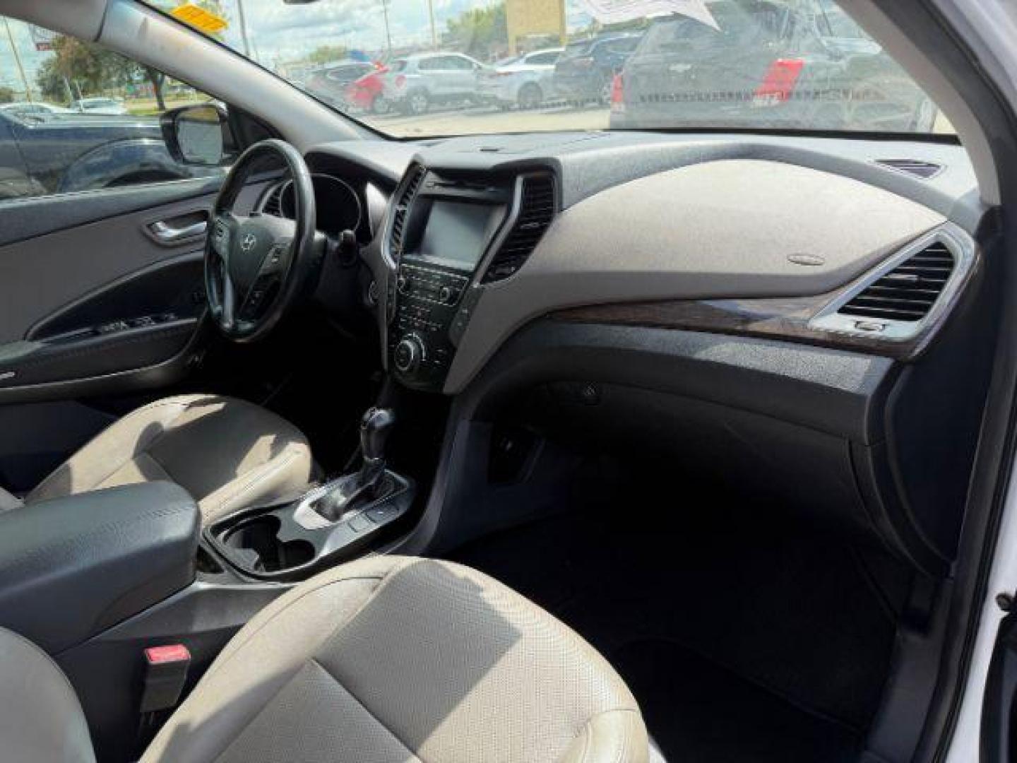 2017 Hyundai Santa Fe Sport 2.0T (5NMZU4LA8HH) with an Theta II 2L I-4 gasoline direct injection engine, located at 2715 W Pioneer Pkwy, Arlington, TX, 76013, (817) 265-9009, 32.710262, -97.153236 - Photo#13