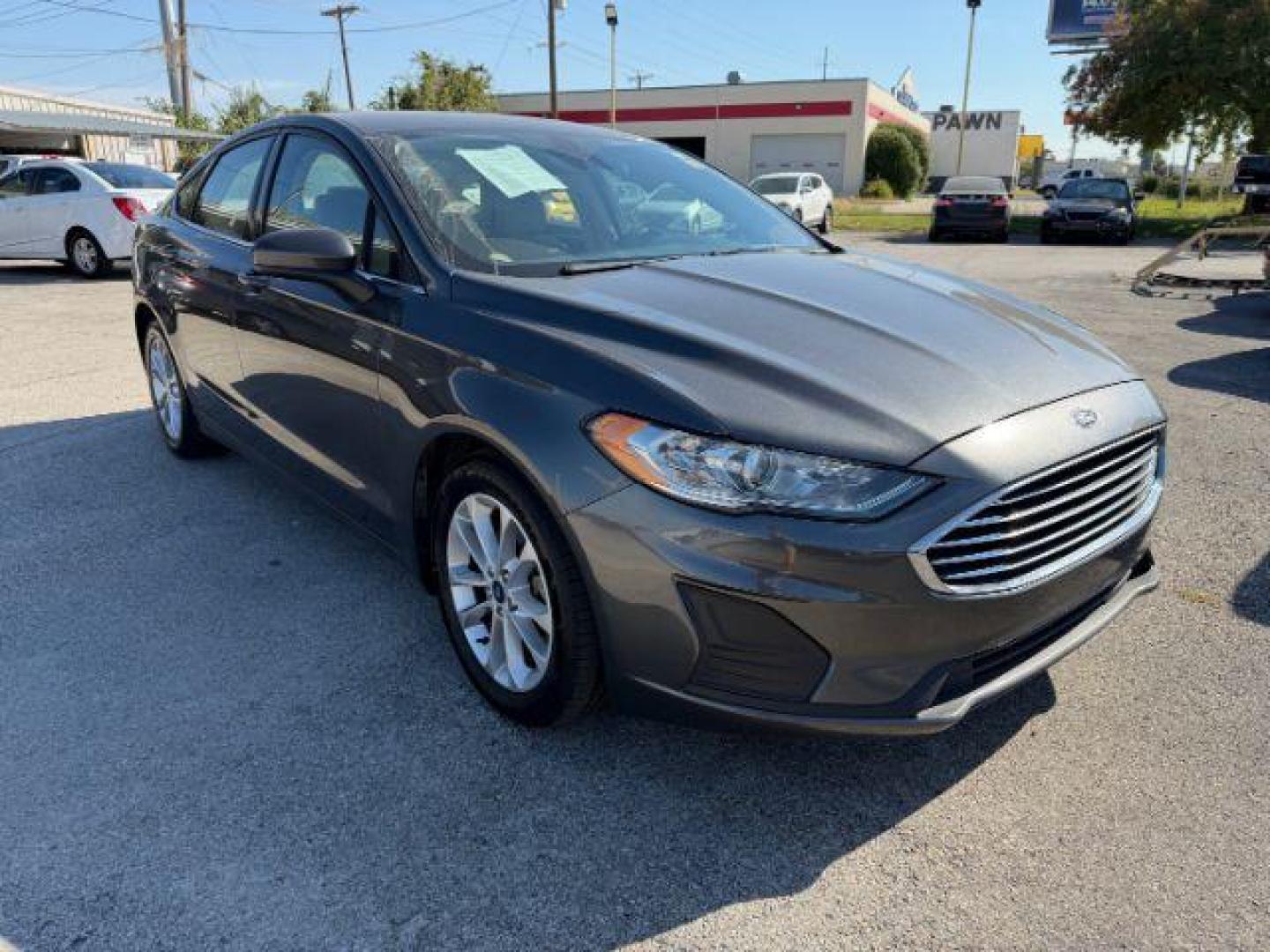 2019 GRAY Ford Fusion SE (3FA6P0H75KR) with an 2.5L L4 DOHC 16V engine, 6-Speed Automatic transmission, located at 2715 W Pioneer Pkwy, Arlington, TX, 76013, (817) 265-9009, 32.710262, -97.153236 - Photo#5