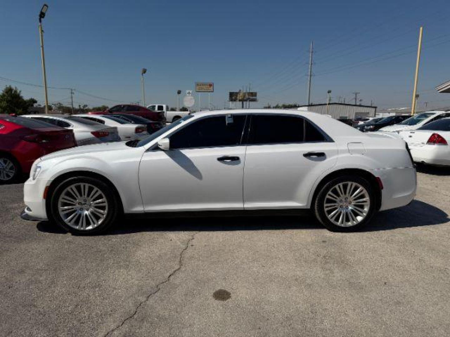 2015 WHITE Chrysler 300 Limited (2C3CCAAG4FH) with an 3.6L V-6 DOHC engine, located at 2715 W Pioneer Pkwy, Arlington, TX, 76013, (817) 265-9009, 32.710262, -97.153236 - Photo#2