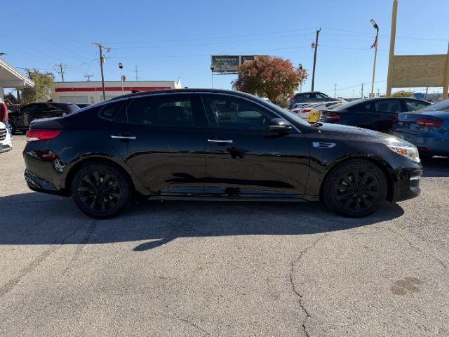 2018 BLACK Kia Optima EX (5XXGU4L34JG) with an Theta II 2.4L I-4 gasoline direct injection engine, located at 2715 W Pioneer Pkwy, Arlington, TX, 76013, (817) 265-9009, 32.710262, -97.153236 - Photo#6