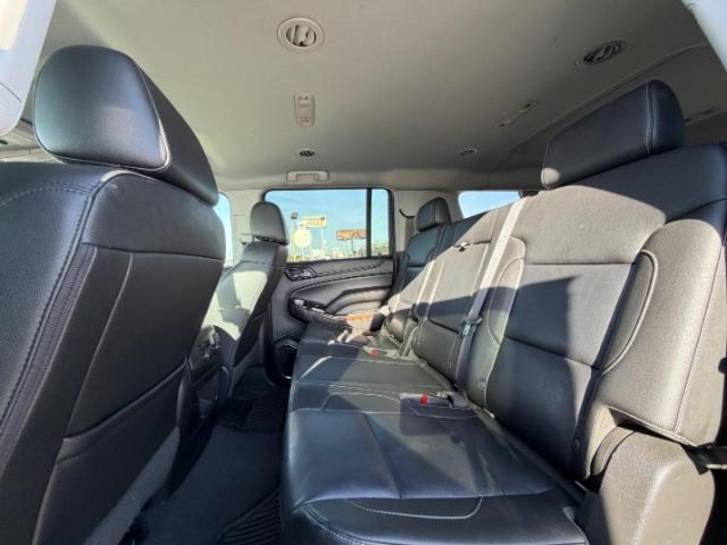 2019 BLACK Chevrolet Suburban LT (1GNSCHKC8KR) with an EcoTec3 5.3L V-8 gasoline direct injection engine, located at 2715 W Pioneer Pkwy, Arlington, TX, 76013, (817) 265-9009, 32.710262, -97.153236 - Photo#10