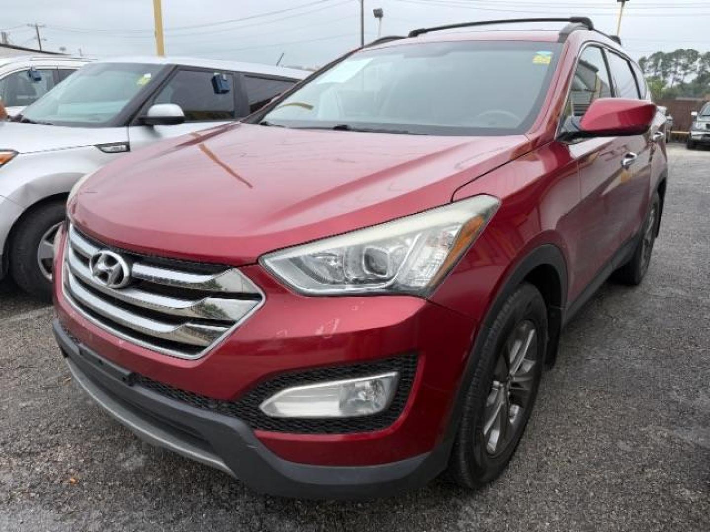 2015 RED Hyundai Santa Fe Sport 2.4L (5XYZU3LB2FG) with an Theta II 2.4L I-4 gasoline direct injection engine, located at 2715 W Pioneer Pkwy, Arlington, TX, 76013, (817) 265-9009, 32.710262, -97.153236 - Photo#1
