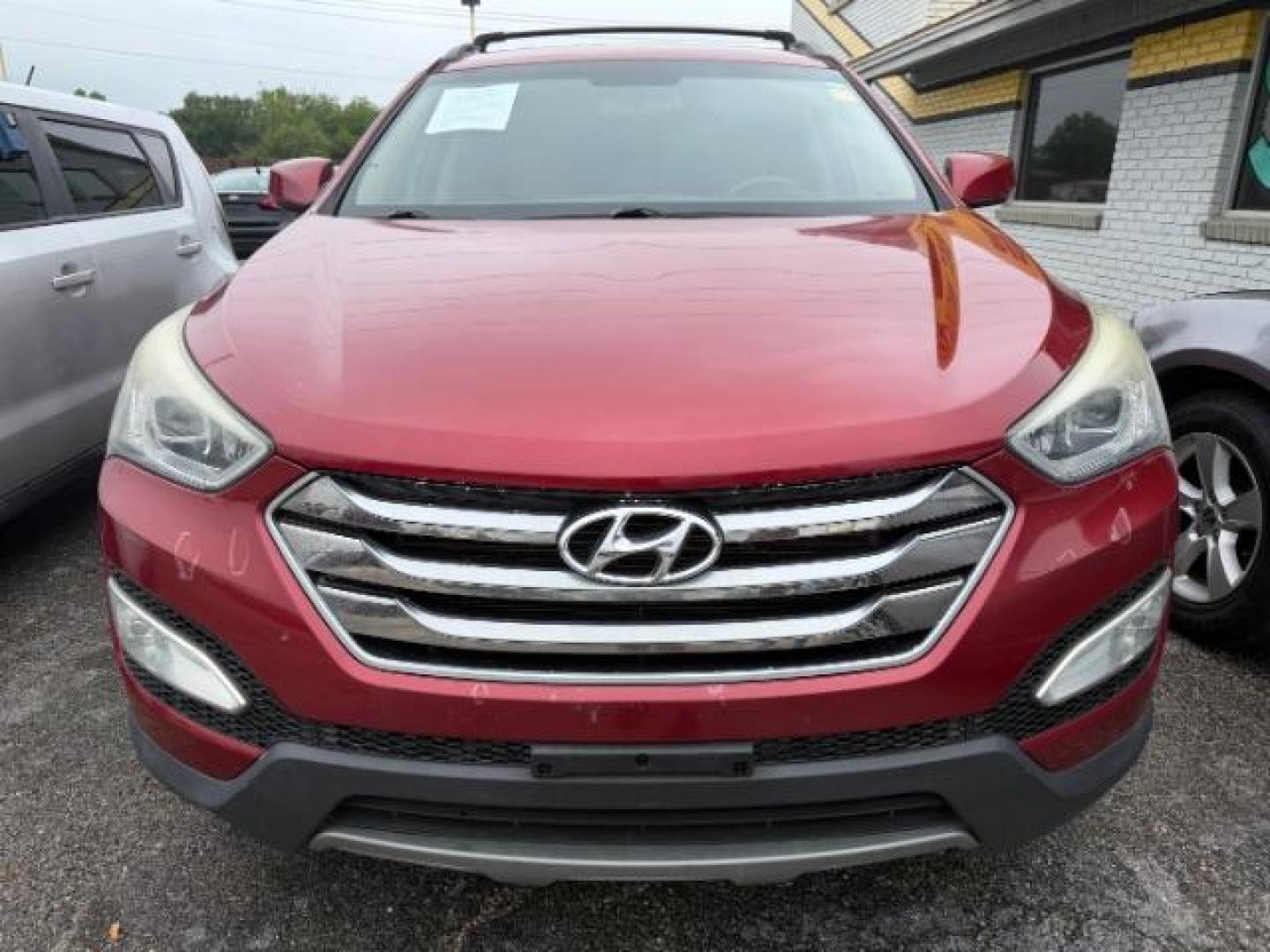2015 RED Hyundai Santa Fe Sport 2.4L (5XYZU3LB2FG) with an Theta II 2.4L I-4 gasoline direct injection engine, located at 2715 W Pioneer Pkwy, Arlington, TX, 76013, (817) 265-9009, 32.710262, -97.153236 - Photo#2