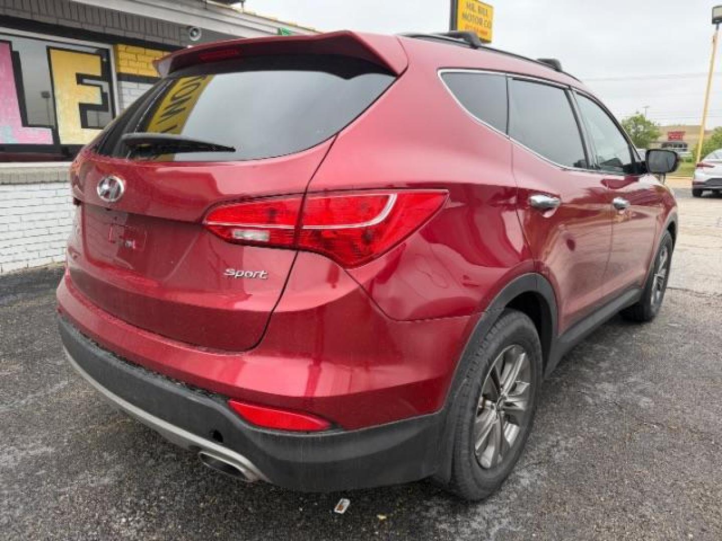 2015 RED Hyundai Santa Fe Sport 2.4L (5XYZU3LB2FG) with an Theta II 2.4L I-4 gasoline direct injection engine, located at 2715 W Pioneer Pkwy, Arlington, TX, 76013, (817) 265-9009, 32.710262, -97.153236 - Photo#4