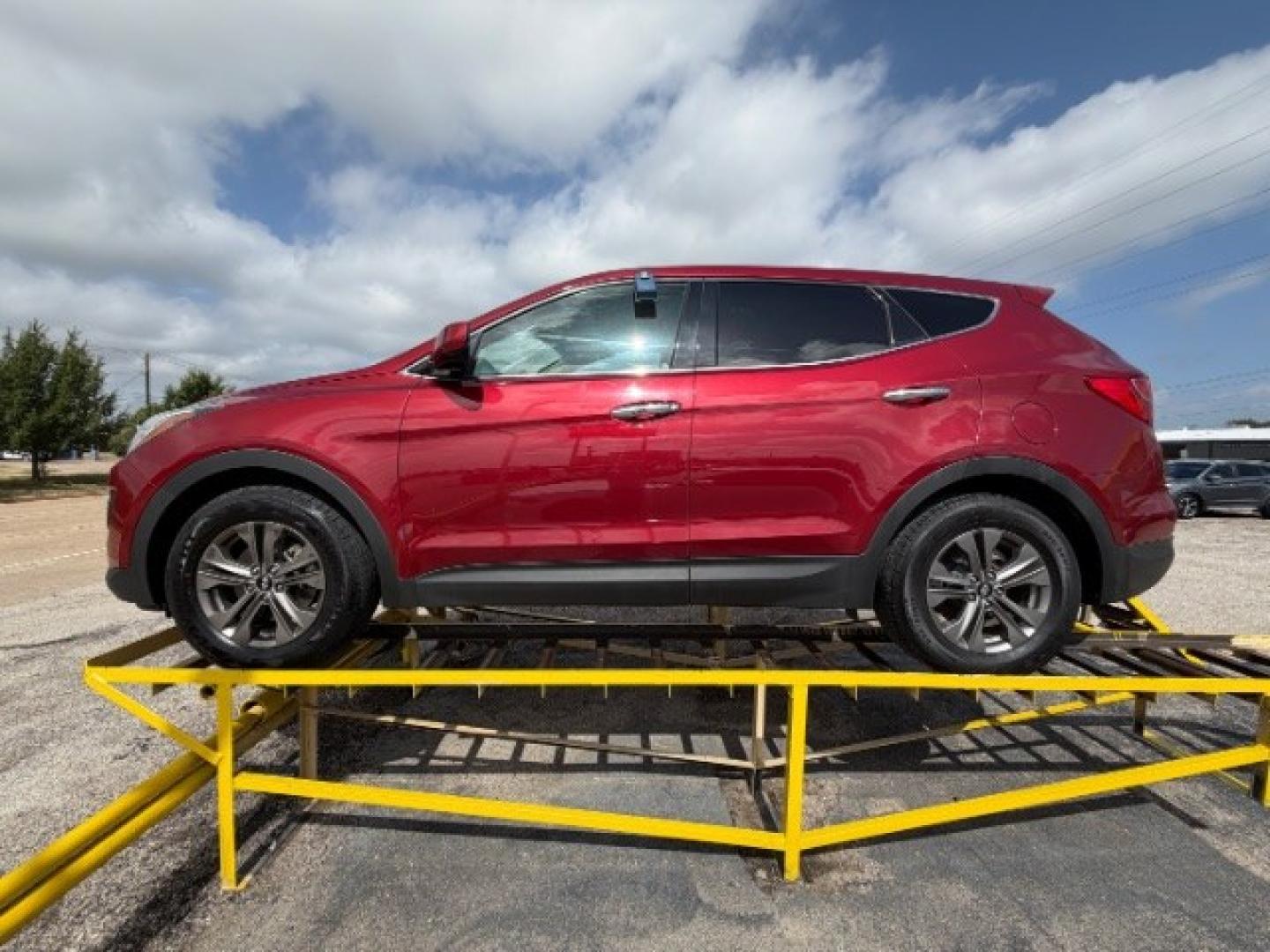 2016 RED Hyundai Santa Fe Sport 2.4L (5XYZT3LBXGG) with an Theta II 2.4L I-4 gasoline direct injection engine, located at 2715 W Pioneer Pkwy, Arlington, TX, 76013, (817) 265-9009, 32.710262, -97.153236- Photo#1