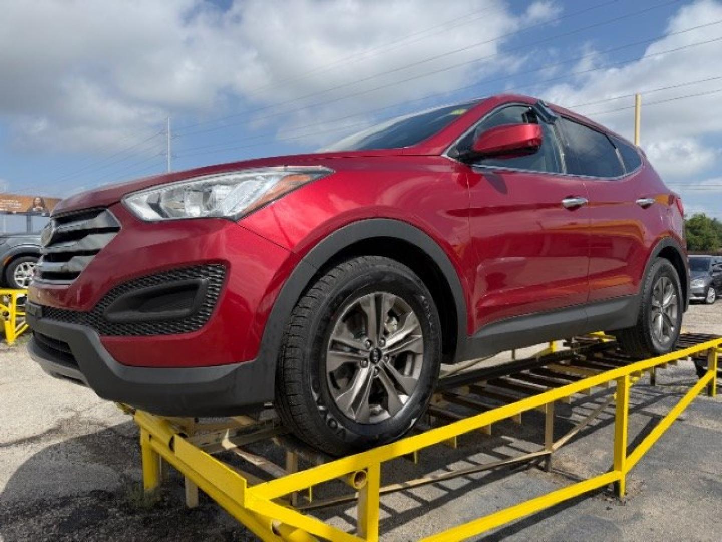2016 RED Hyundai Santa Fe Sport 2.4L (5XYZT3LBXGG) with an Theta II 2.4L I-4 gasoline direct injection engine, located at 2715 W Pioneer Pkwy, Arlington, TX, 76013, (817) 265-9009, 32.710262, -97.153236- Photo#2